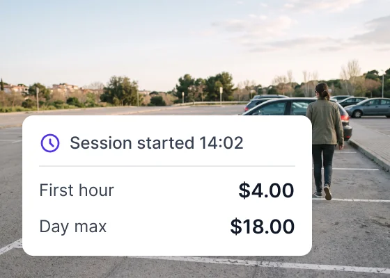 Driver walking to their car on an open lot, session started at 14:02 with the first hour and day max shown